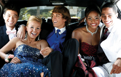 Teens in front of a Limousine