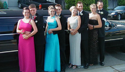 Teens Standing in front of a Limousine