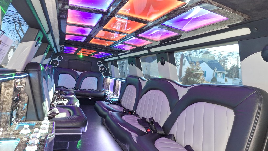 Luxurious interior of white stretch Cadillac Escalade Limo Rental Luxurious interior of white stretch Cadillac Escalade Limo Rental